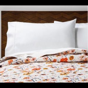 Multi floral Medallion stitch quilt.